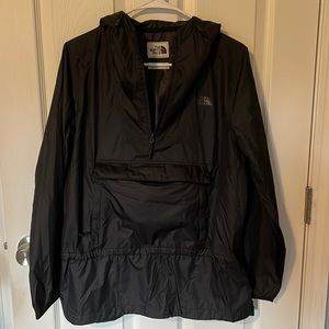 Women’s north face wind beaker,zipper and button pouch fold into front pocket